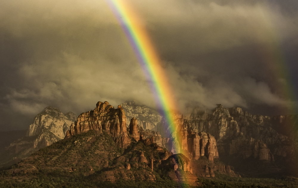 Brilliant rainbow marks the end of a storm, Sedona, AZ