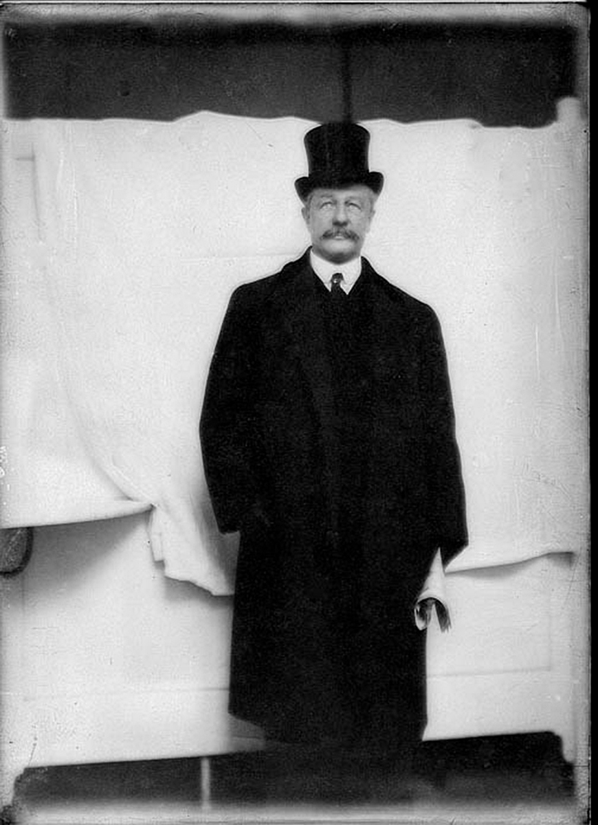 I used to scrounge around flea markets looking for old photo albums, carte de visites, and glass plate negatives for my collection. While I have no idea who this gentleman may be, who made the image or what year it was made, the outfit seems to pin the year as the late nineteenth century, when gelatin glass plates were in fashion. I scanned it on a flatbed and “flipped” the negative by choosing “black and white negative” in the parameter settings.