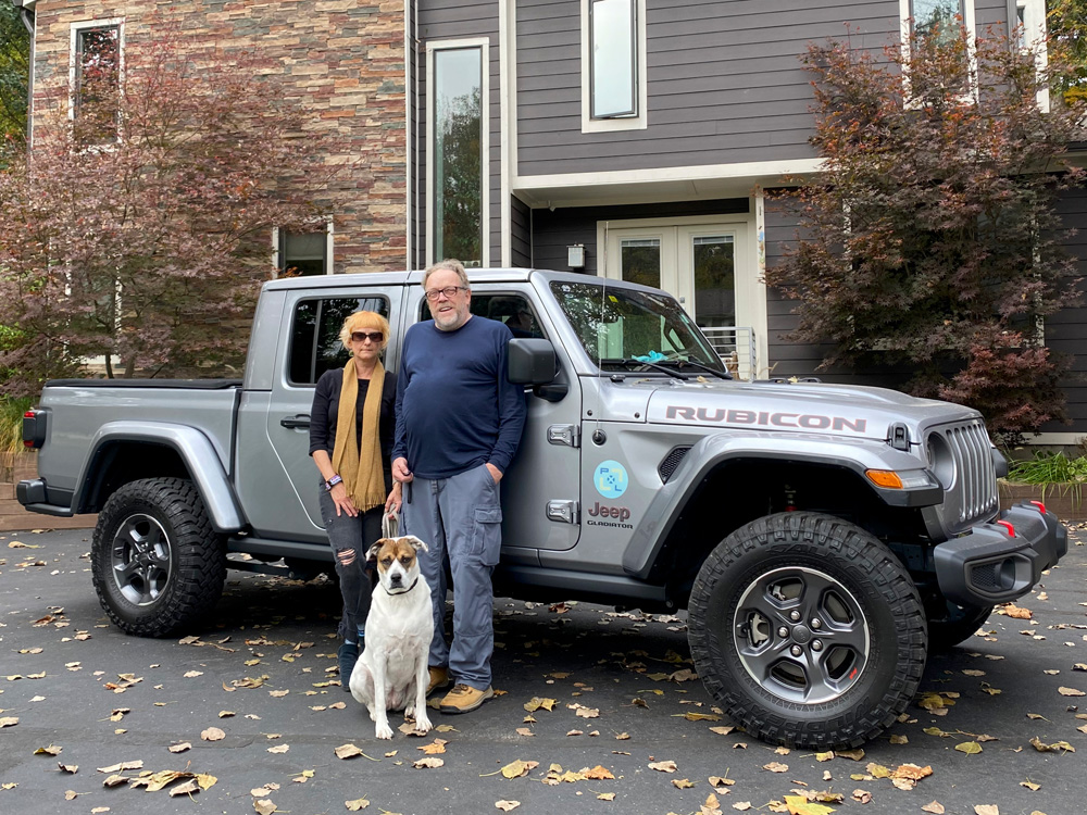 Debra, Kevin and our dog Maggie with our adventure Jeep Gladiator. We are a two jeep family.
