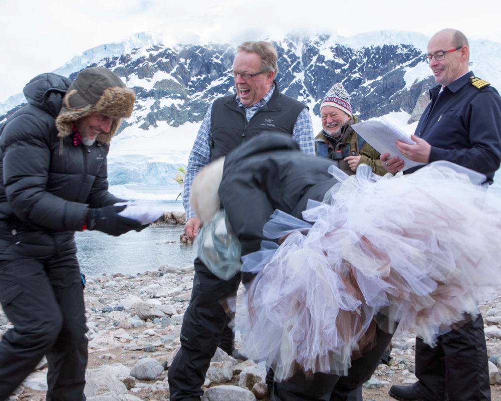A friend of ours shared this image from our wedding in Antarctica this week. It makes us smile as few remember such a great day. Christian Fletcher our ring boy managed to drop our rings in penguin pooh. We had a good laugh. Michael Reichmann is seen in the background.
