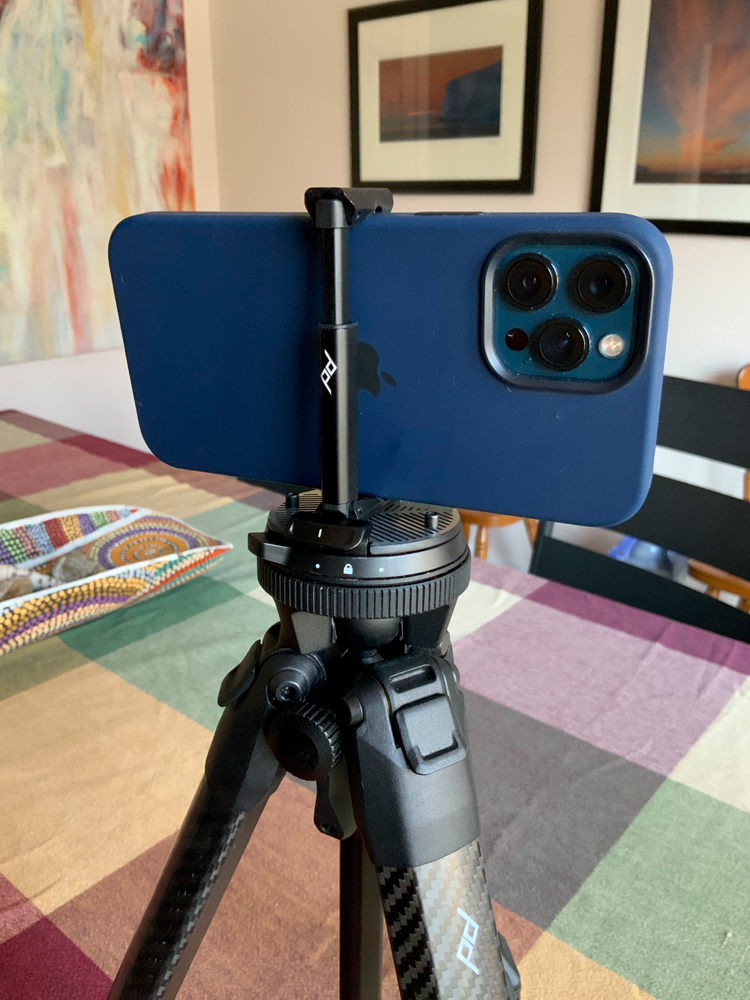 Using the iPhone attachment on the tripod. Even works with iPhone case attached.