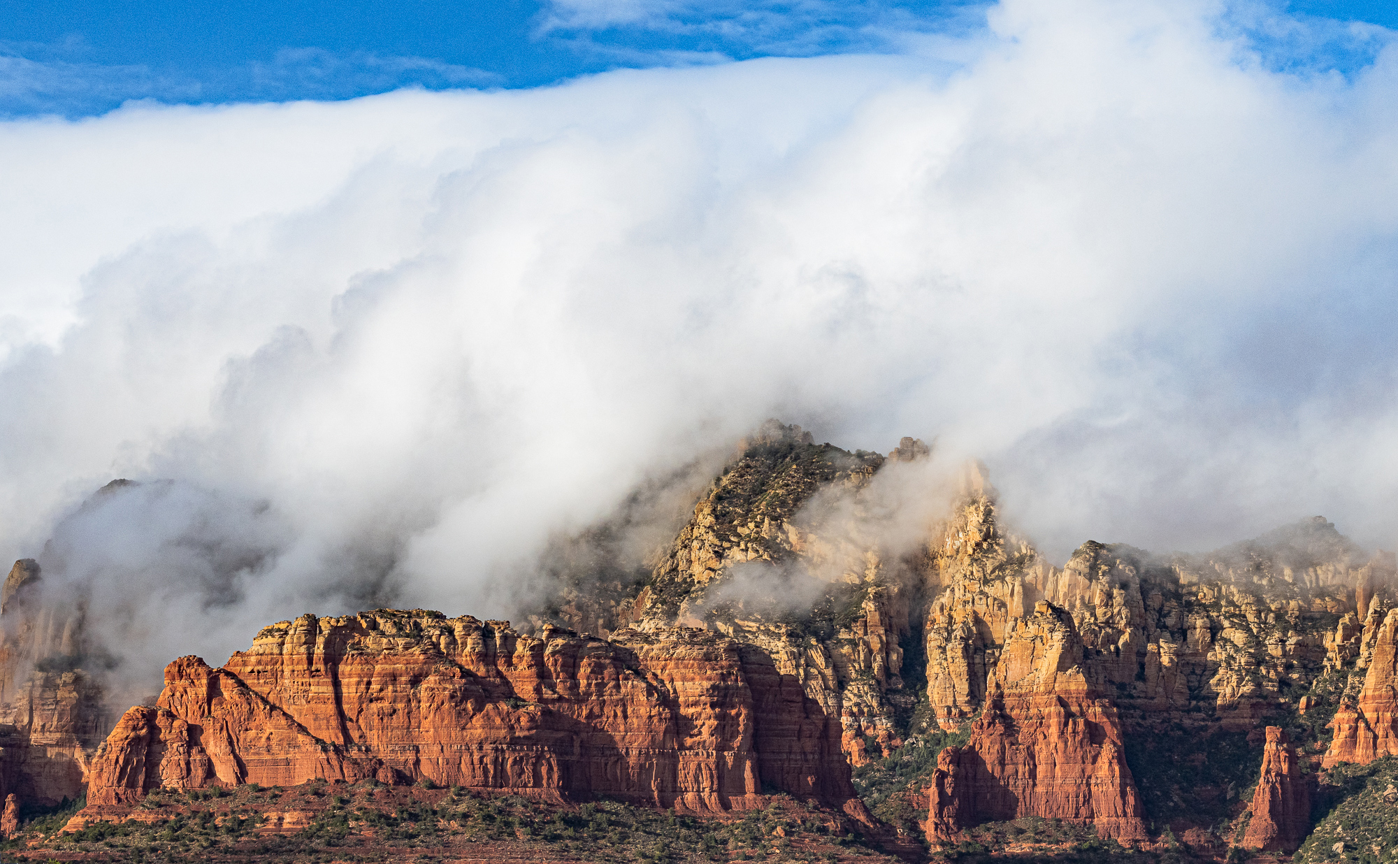 Cloud Dominated Red Rock Scene with Abundant Shadow Detail