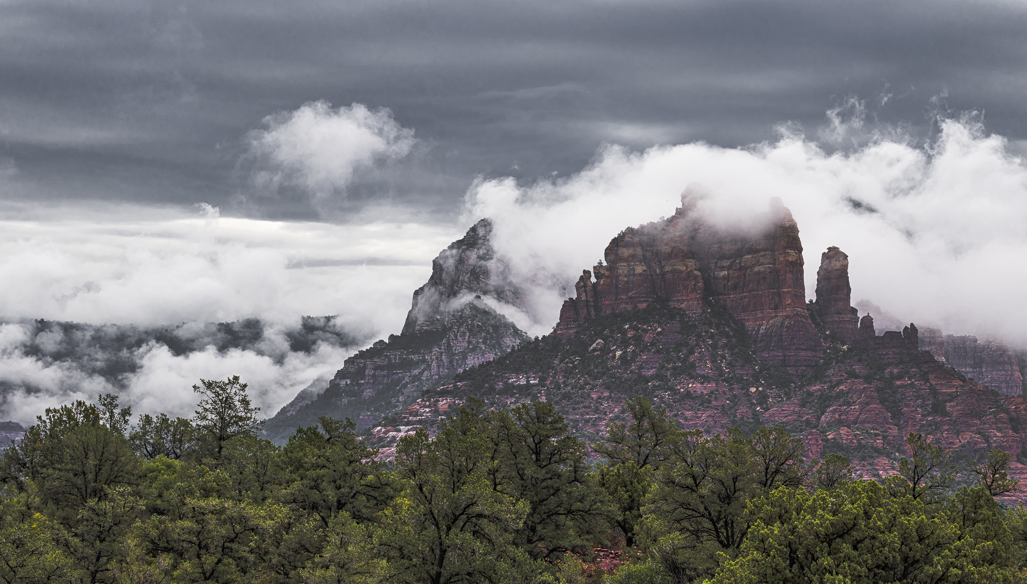 Monsoon Clouds Over the Crimson Cliffs