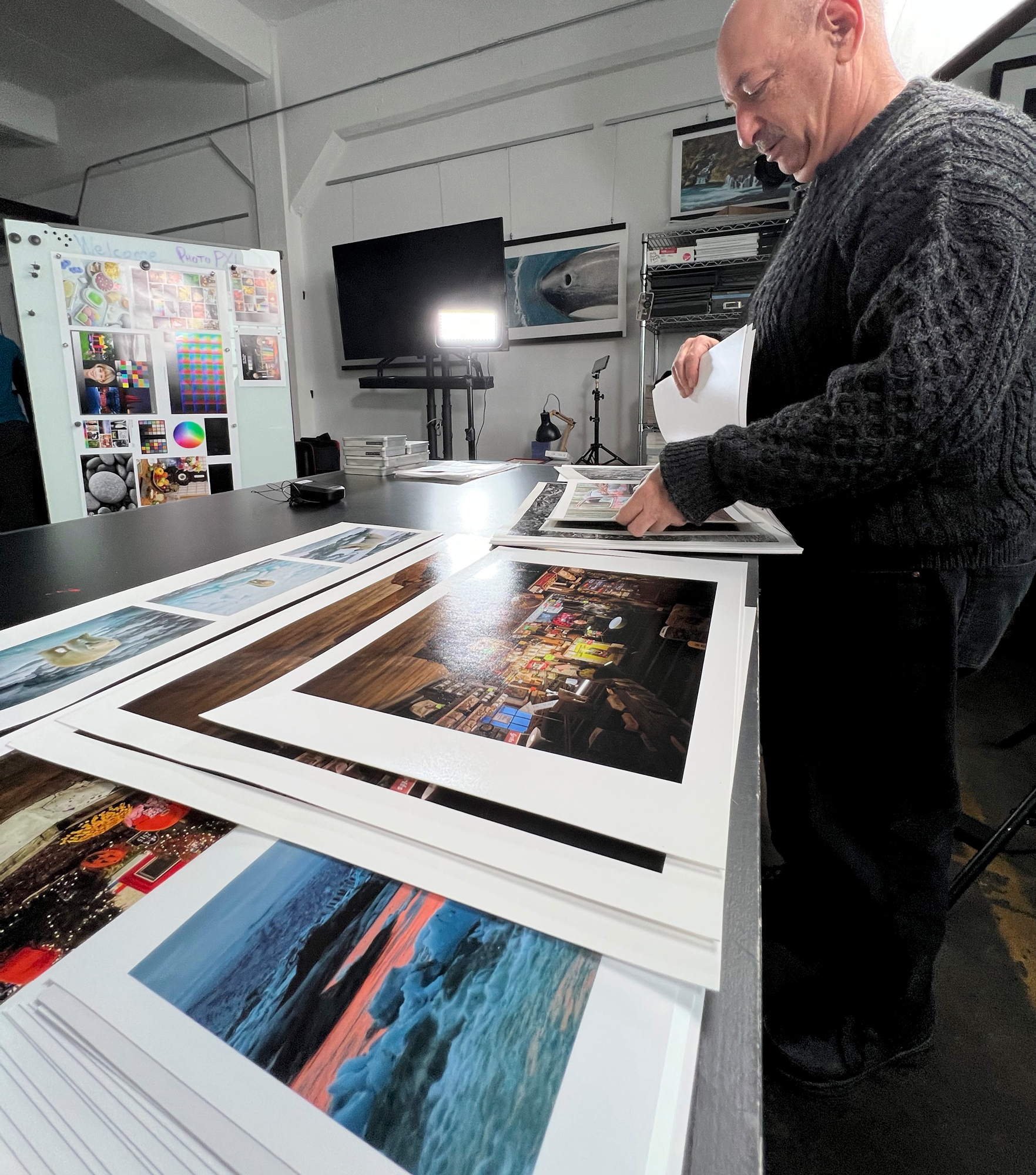 Dano sorting through some of the prints he brought