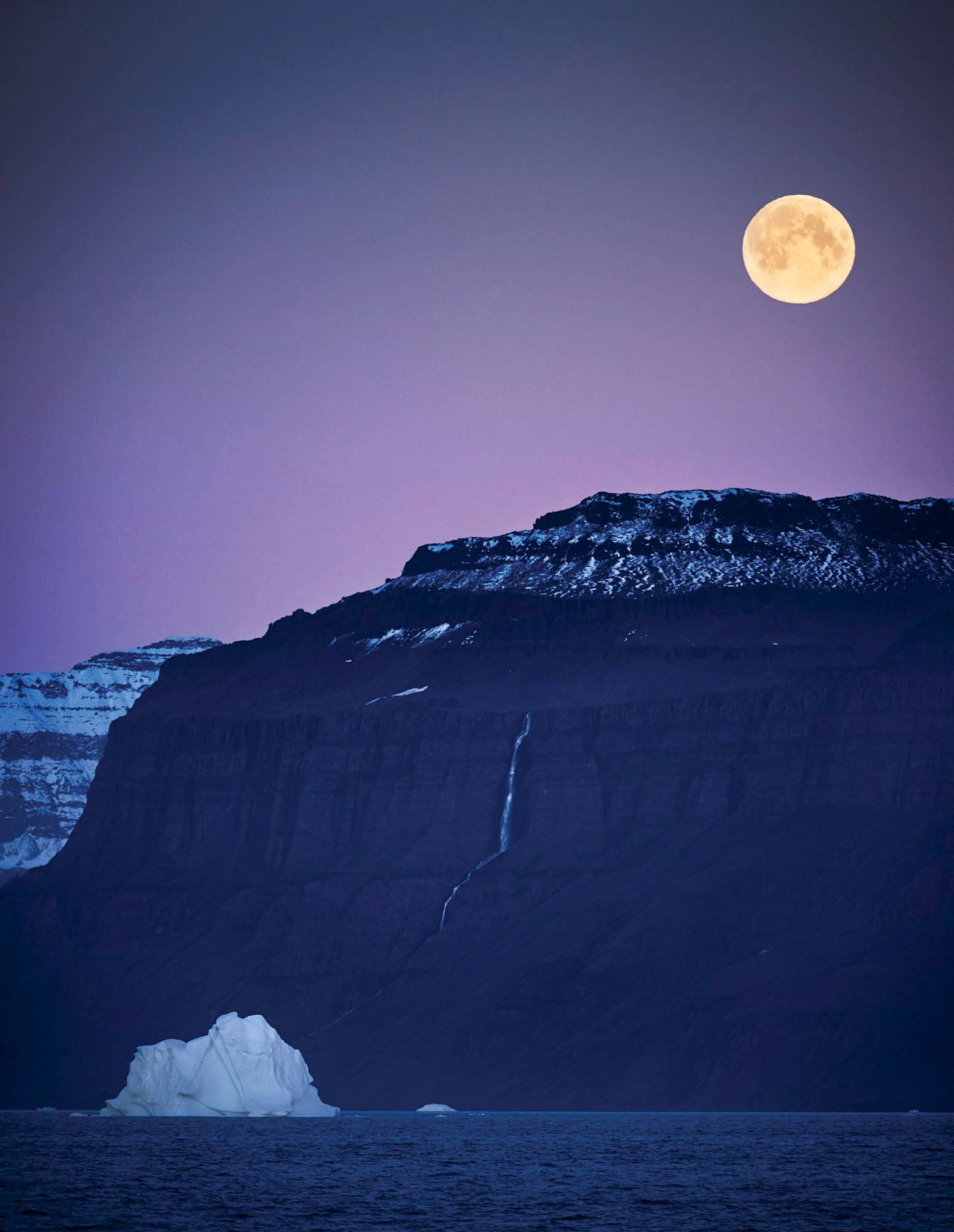 Here the moon and iceberg balance each other because both are lighter in tone than their surroundings, and because they are in opposite corners.
