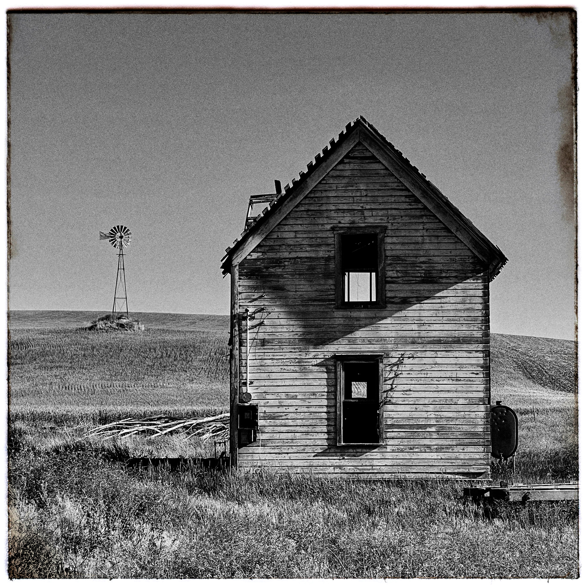 Another abandoned house and windmill