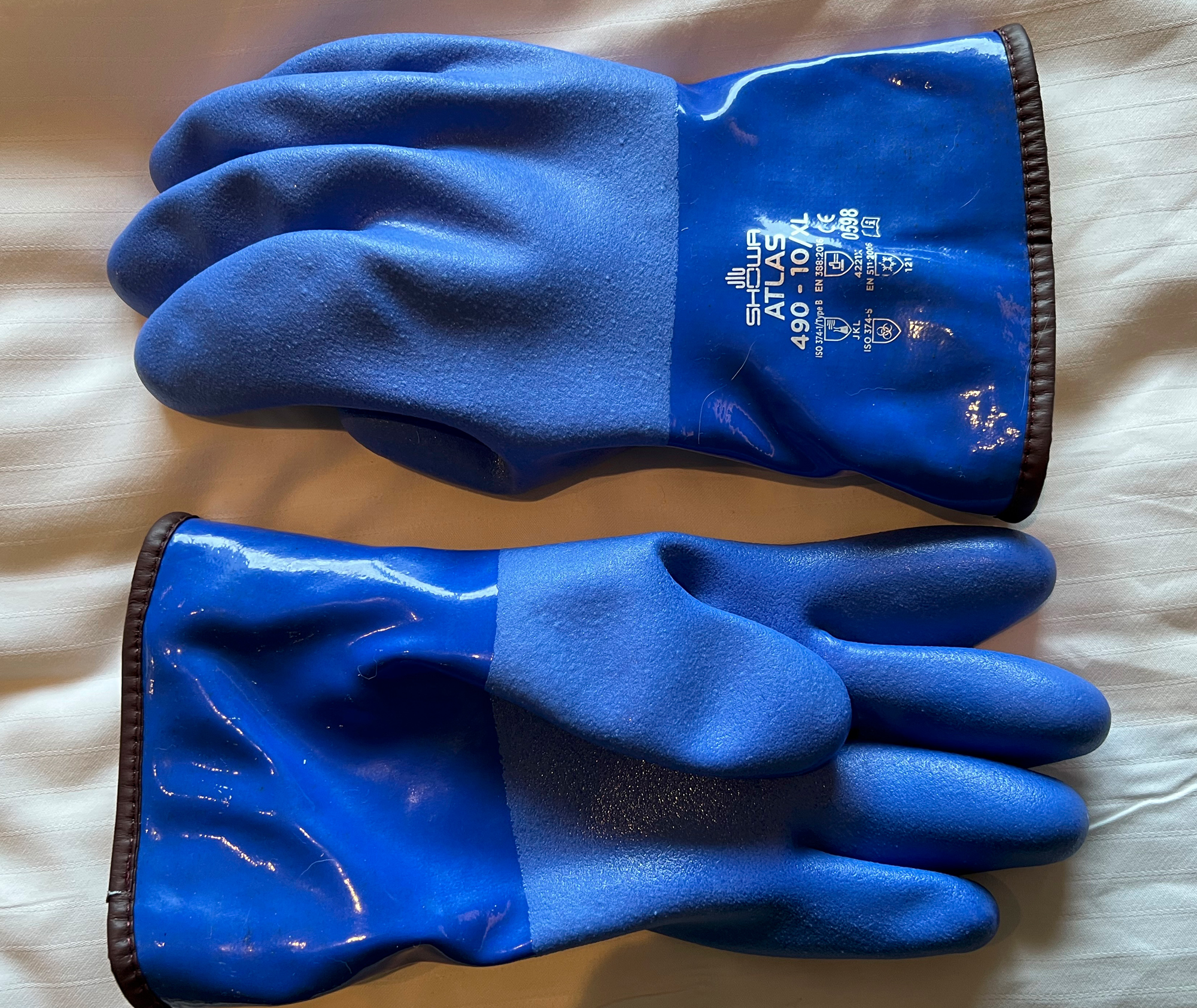 These are the best gloves ever. They are waterproof, keep your hands warm and are textures enough you can adjust dials and setting on your camera. These have served me well. Even though they look wierd.