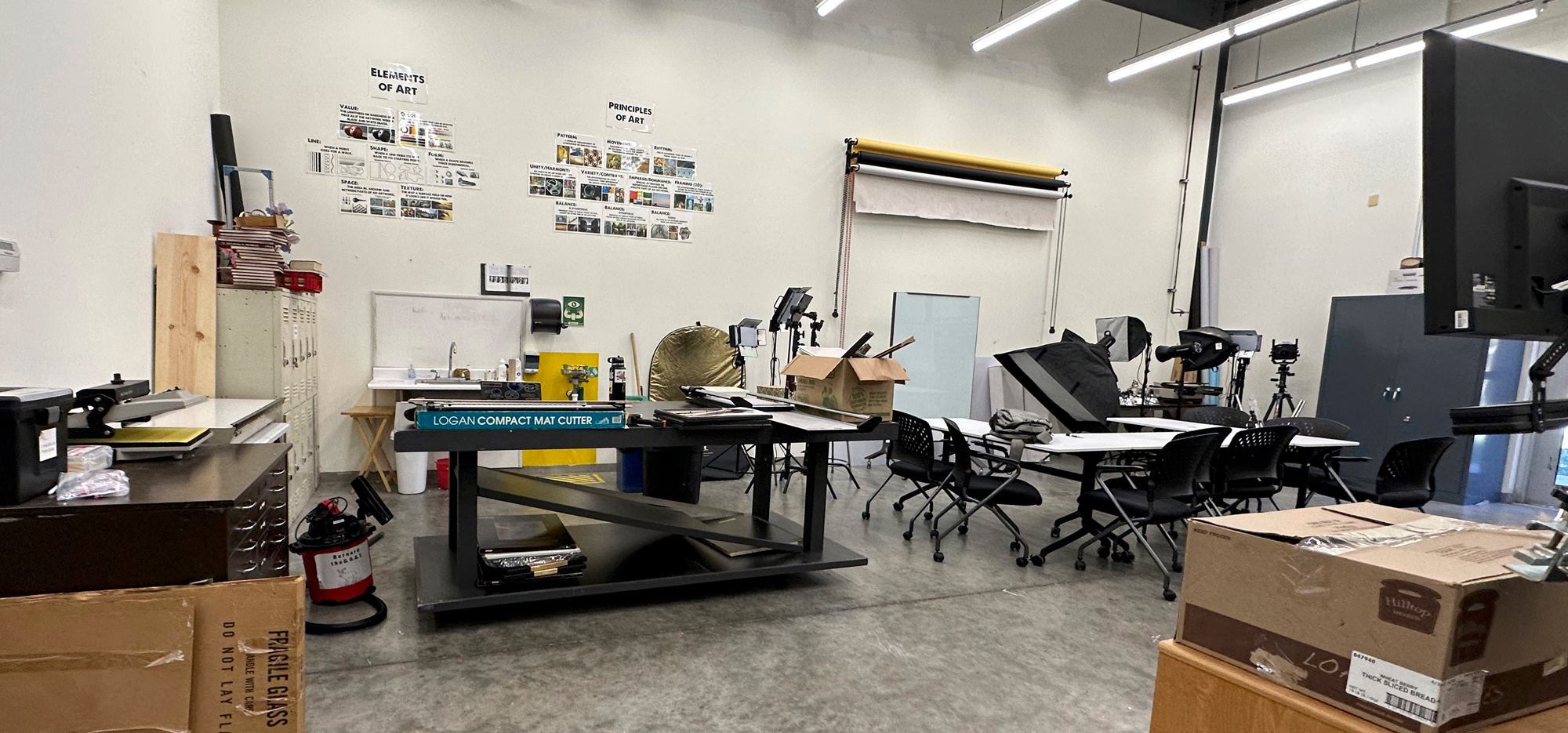 This is a view of the Digital Studio at the Art Center. As you can see it is large with high cielings and big enough we can have a shooting area, and plenty of room for classroom chairs and tables as well as the printers, print inspection station and my two large 4x8 tables that can be used for working on projects and large prints. 