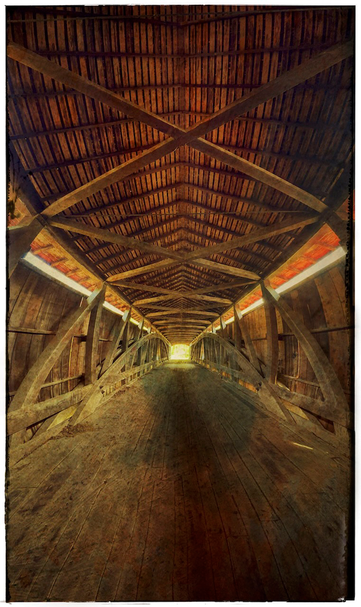 The inside of above bridge done with an iPhone using vertical pano. It took a couple of tries to get it right. Then finished off in Snapped and Distressed+.