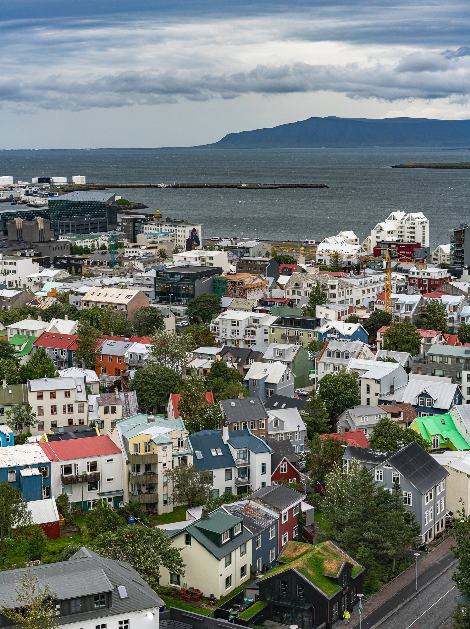 A View of Reykjavik, Iceland with Harbor & Mountains beyond